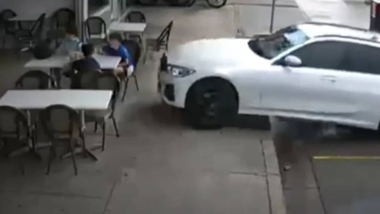 Horrifying moment car ploughs into children sitting outside chicken shop after &lsquo;driver hit accelerator instead of brake&rsquo;