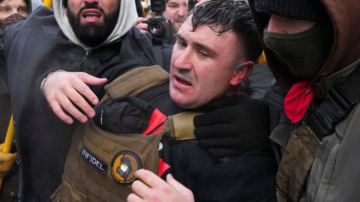 Pardoned Jan 6 rioter chased from pro-ICE rally in Minneapolis after blasting &lsquo;Ice, Ice Baby&rsquo; and threats to burn Quran