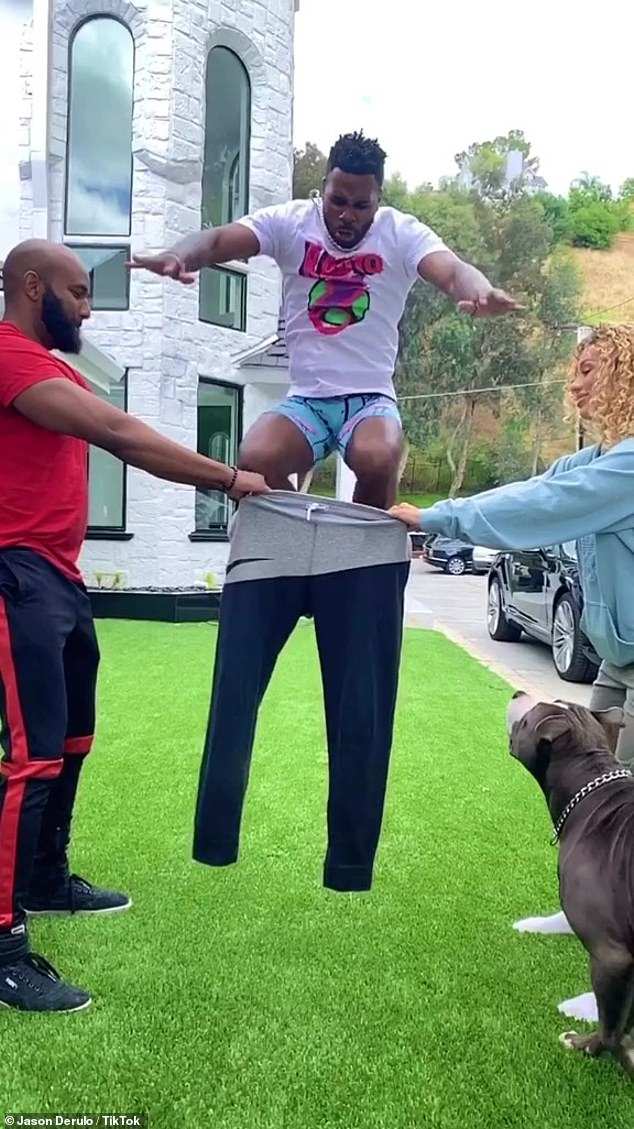 Jason Derulo shows off his impressive leaping ability by ...
