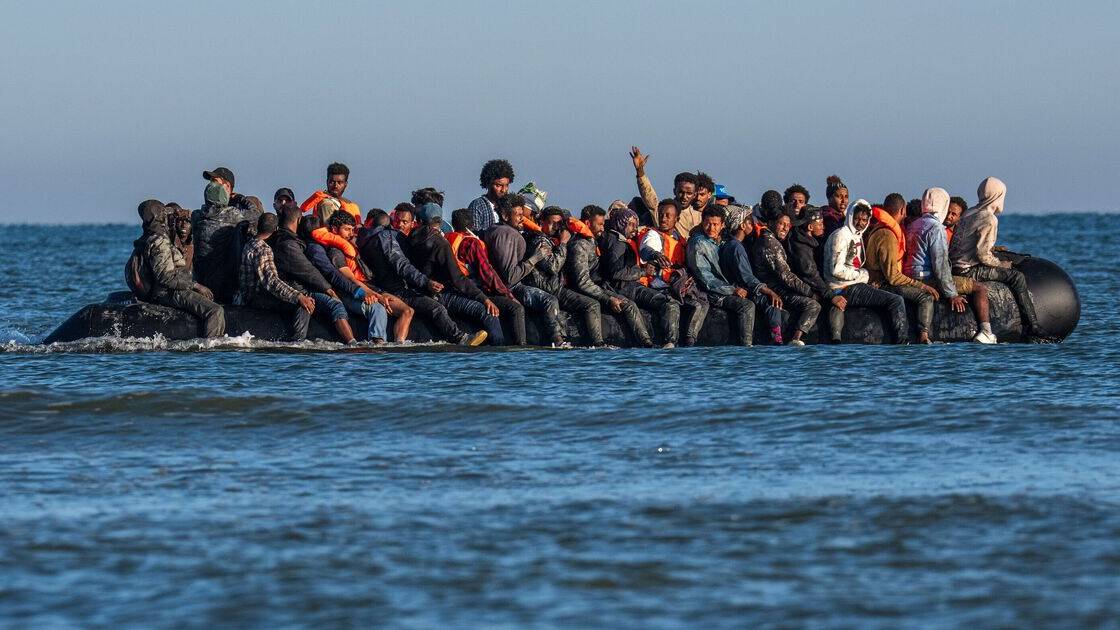 Outrage as migrants 'flee to UK on boat after killing man on beach'