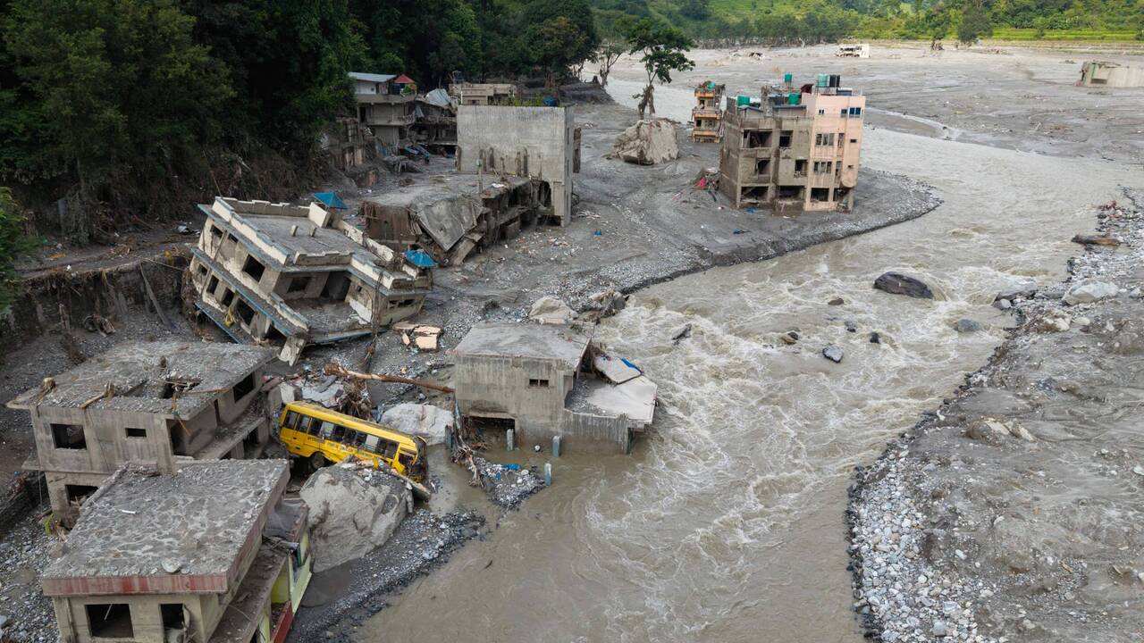 &lsquo;We will rise again&rsquo; vow Nepalis as they begin rebuilding after deadly floods leave 810 dead & more than 3,000 missing