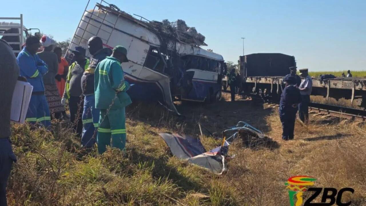 At least 9 killed including two children & 25 injured as train smashes into bus at railway crossing
