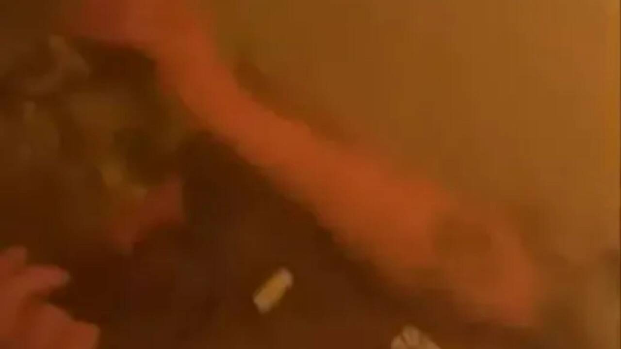 Terrifying moment &lsquo;Iranian missile strikes yards from US troops&rsquo; taking cover from attack as blast covers them in debris