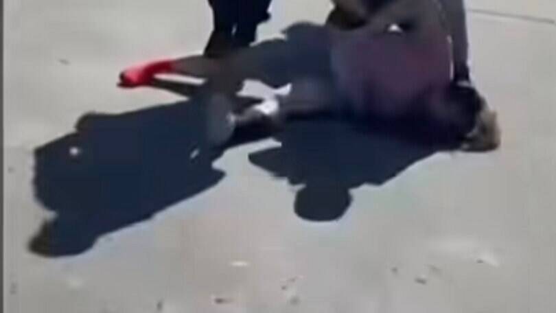 Woman &lsquo;tries to abduct girl, 3, from mum&rsquo;s car in KFC car park&rsquo; as dramatic vid shows cops tackle stranger to the ground