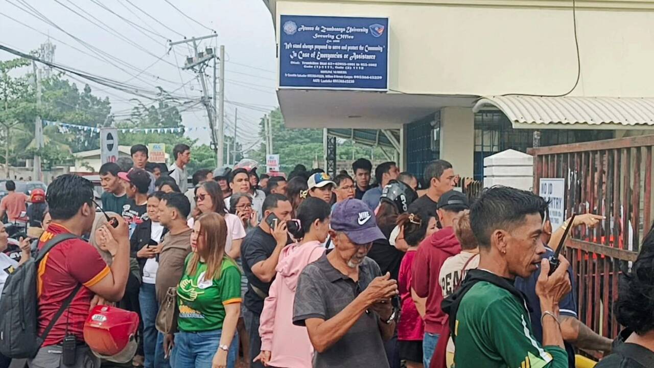 Gunman armed with pistol & rifle opens fire at Philippines school killing at least one student before shooting himself