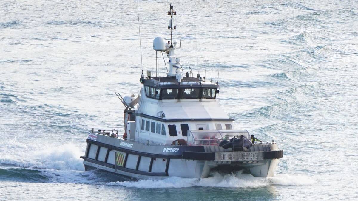 Migrants arrive in UK wearing blankets after crossing English Channel