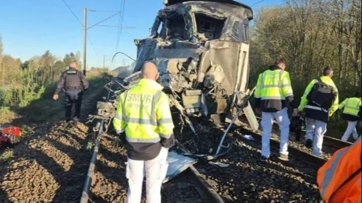 At least one dead and 27 injured after packed train carrying 250 people smashes into truck in horror rush hour crash